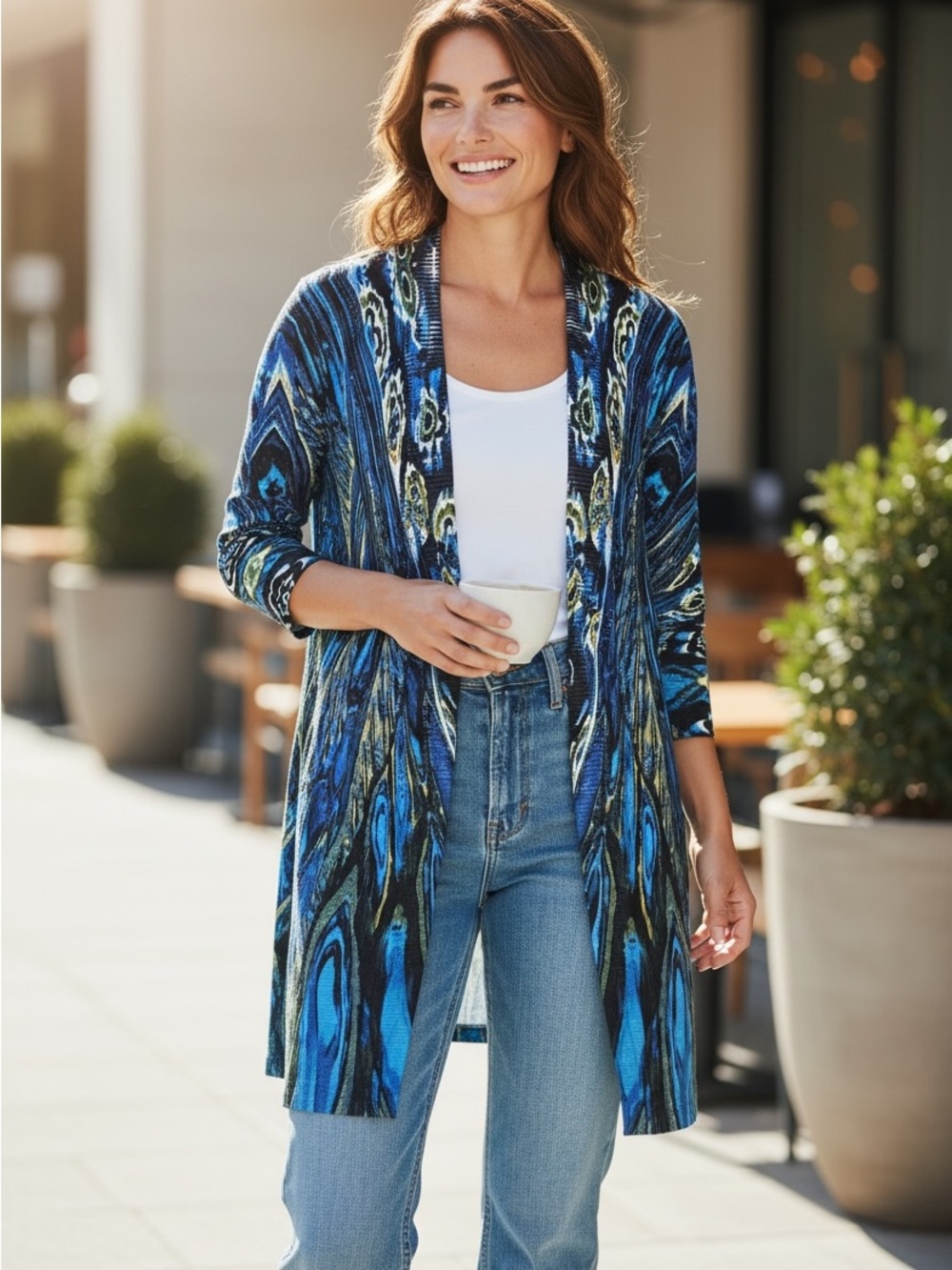 Alberto Makali Blue sweater peacock design. Intricate small beading accents